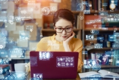 Image of young woman coding