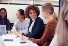 Image of business women discussing in a meeting