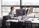 Image of business woman working at her work desk